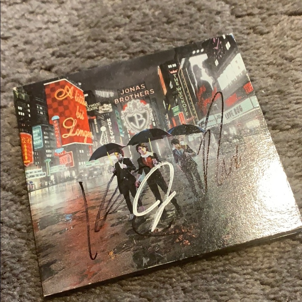 jonas brothers vintage HAND AUTOGRAPHED CD